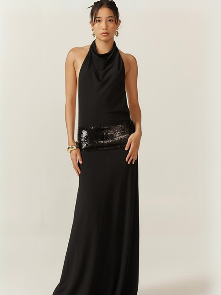 Robe noire longue dos nu plongeant col drapé