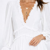 Robe dos nu manches longues