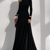 Robe longue dos nu col montant