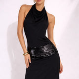 Robe noire longue dos nu plongeant
